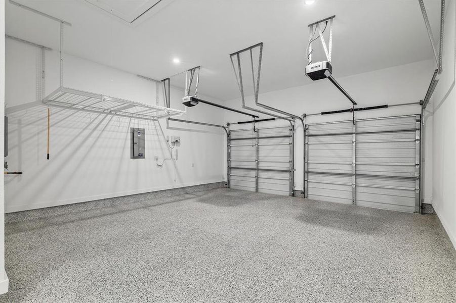 Garage with electric panel and a garage door opener Garage with electric panel and a garage door opener