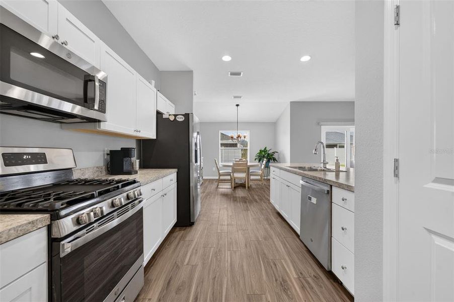 Furnished interior view inside a new home in , The Villages (Image 10).