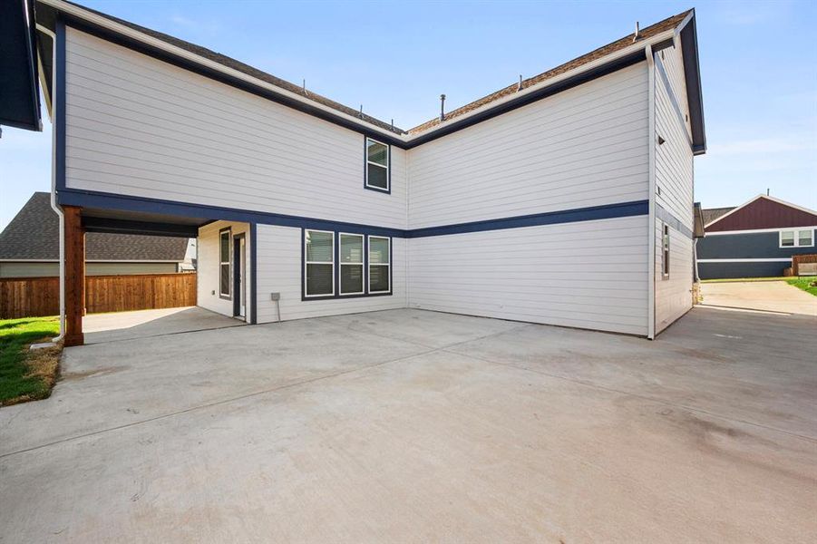 Front exterior of a new home in Heritage Towne, Grand Prairie, TX, highlighting curb appeal (Image 21).