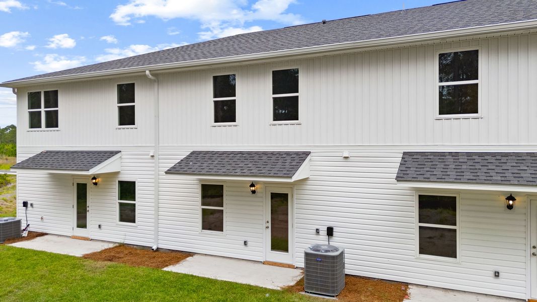 Exterior details and patio area of a home in Chateau Nemours, Port Saint Joe (Image 24). Exterior details and patio area of a home in Chateau Nemours, Port Saint Joe (Image 24).