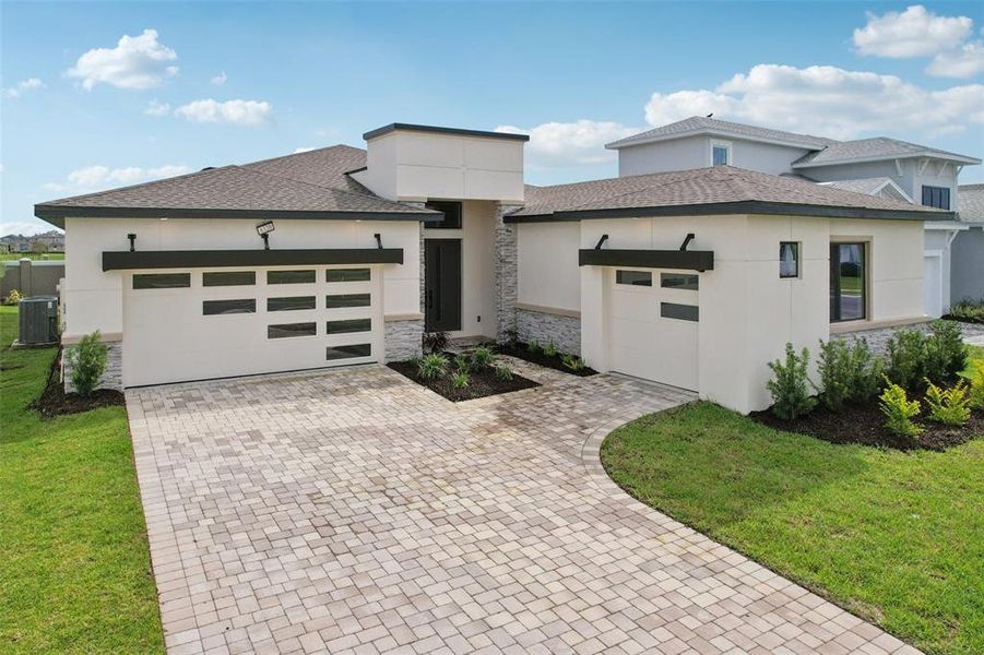 Front exterior of a new home in Biscayne Landing at Seaire, Parrish, FL, highlighting curb appeal (Image 23).
