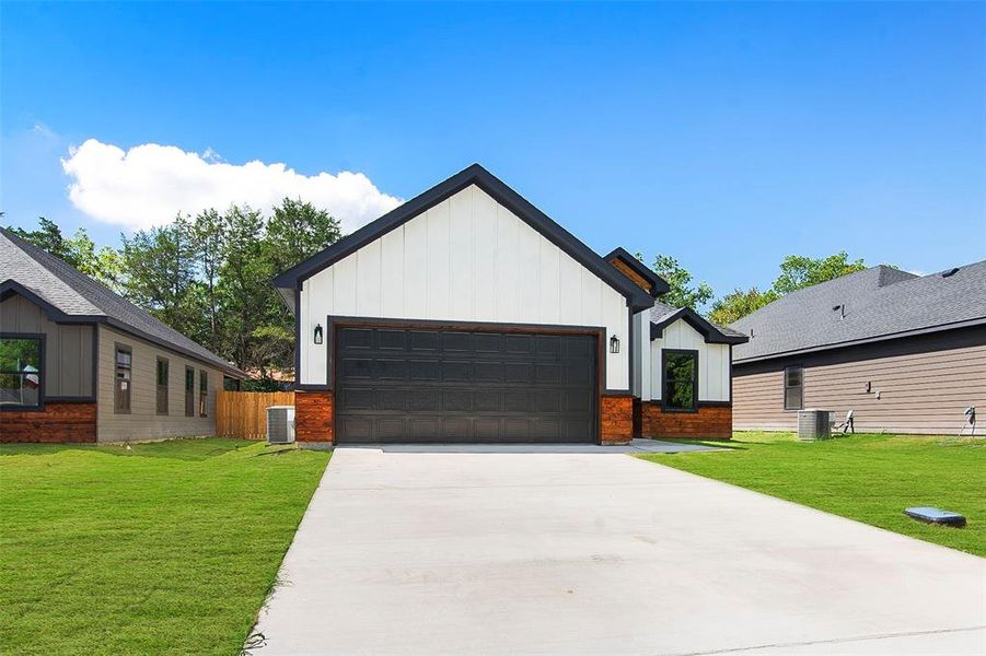 Front exterior of a new home in , Whitewright, TX, highlighting curb appeal (Image 2). Front exterior of a new home in , Whitewright, TX, highlighting curb appeal (Image 2).