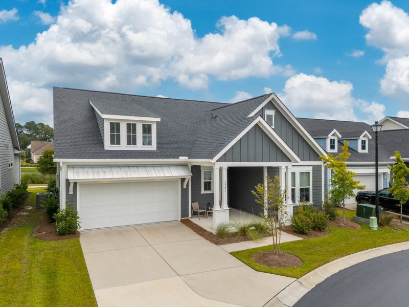 Front exterior of a new home in , Mount Pleasant, SC, highlighting curb appeal (Image 1). Front exterior of a new home in , Mount Pleasant, SC, highlighting curb appeal (Image 1).
