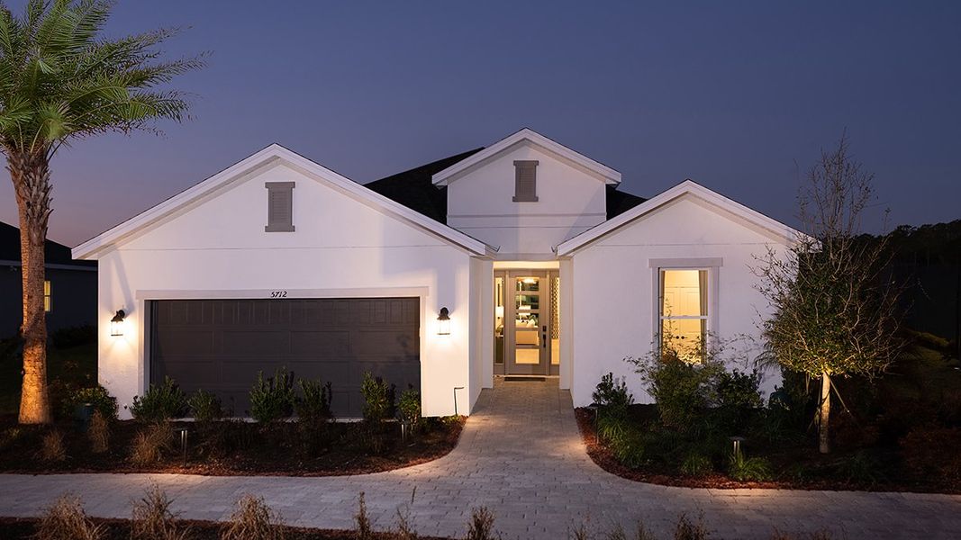 Representative exterior photo of a completed home built from the Monte by Taylor Morrison in Esplanade at Wellen Park, Englewood, FL (Image 25).