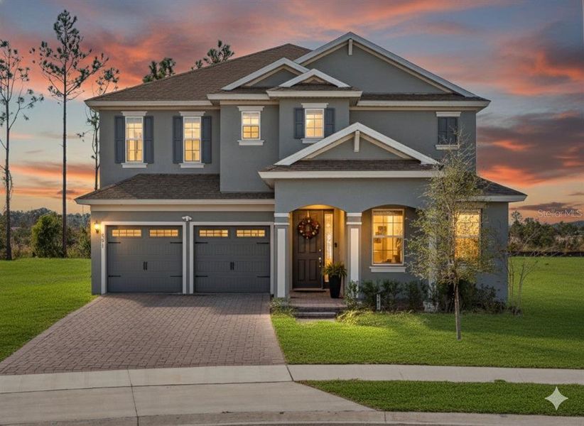Front exterior of a new home in Talichet, Howey-in-the-Hills, FL, highlighting curb appeal (Image 1). Front exterior of a new home in Talichet, Howey-in-the-Hills, FL, highlighting curb appeal (Image 1).