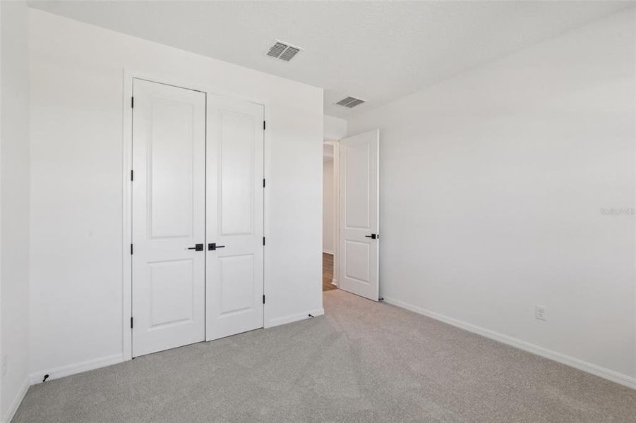 Spacious, unfurnished interior of a new home in Primrose at Longleaf, New Port Richey (Image 43).