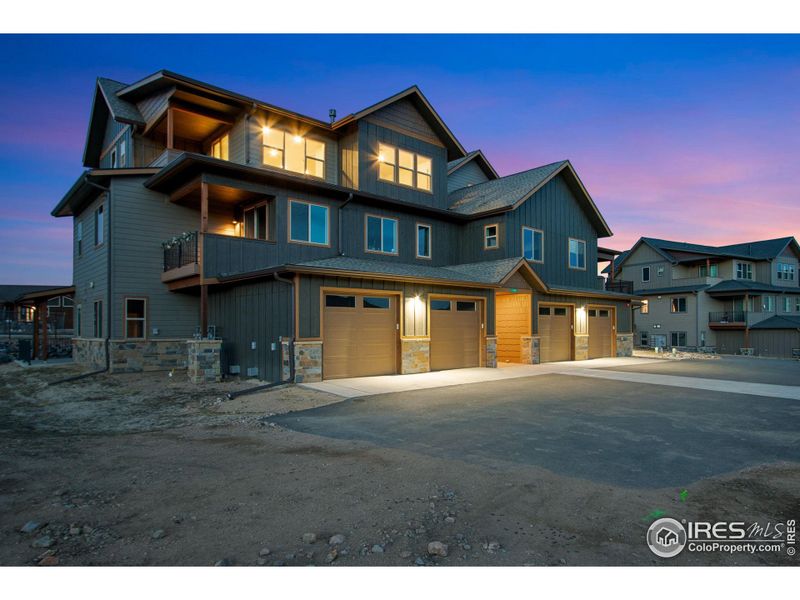 Front exterior of a new home in , Estes Park, CO, highlighting curb appeal (Image 16).
