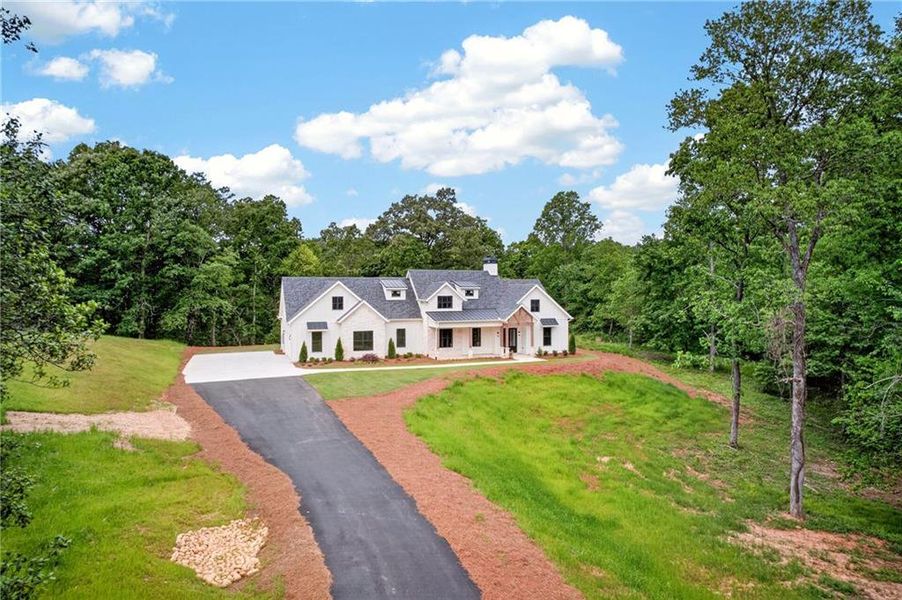 Front exterior of a new home in , Ellijay, GA, highlighting curb appeal (Image 29). Front exterior of a new home in , Ellijay, GA, highlighting curb appeal (Image 29).