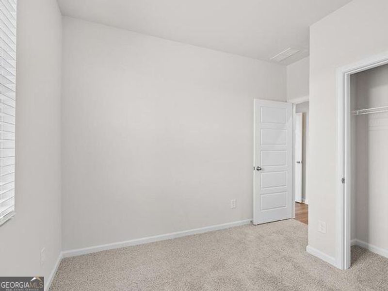 Spacious, unfurnished interior of a new home in Remington Chase, Perry (Image 27).