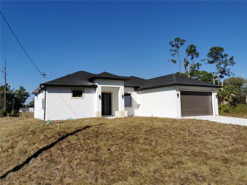 Exterior details and patio area of a home in , Lehigh Acres (Image 3).