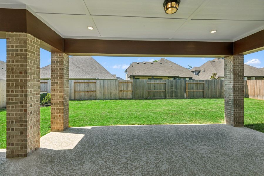 Exterior details and patio area of a home in Sienna 65' Homesites, Missouri City (Image 4).