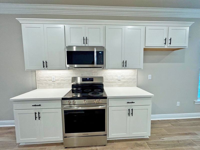 Furnished interior view inside a new home in Natureview, Freeport (Image 12).