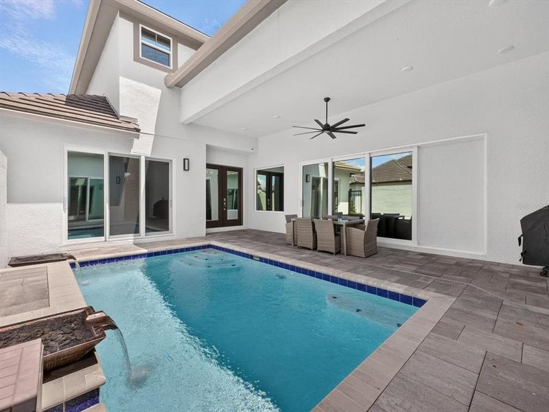 Exterior details and patio area of a home in , Davenport (Image 3).