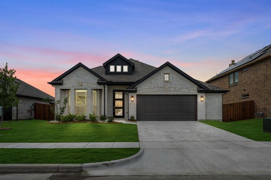 Front exterior of a new home in Ridge Ranch, Mesquite, TX, highlighting curb appeal (Image 2). Front exterior of a new home in Ridge Ranch, Mesquite, TX, highlighting curb appeal (Image 2).