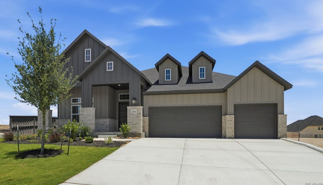 Front exterior of a new home in Prominence Urban, San Antonio, TX, highlighting curb appeal (Image 26). Front exterior of a new home in Prominence Urban, San Antonio, TX, highlighting curb appeal (Image 26).