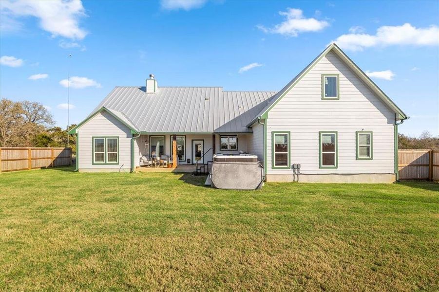 Metal Roof, large yard, spa/pool, fenced .