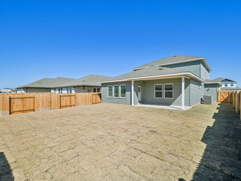 Exterior details and patio area of a home in Waterstone Crossing, Kyle (Image 3).