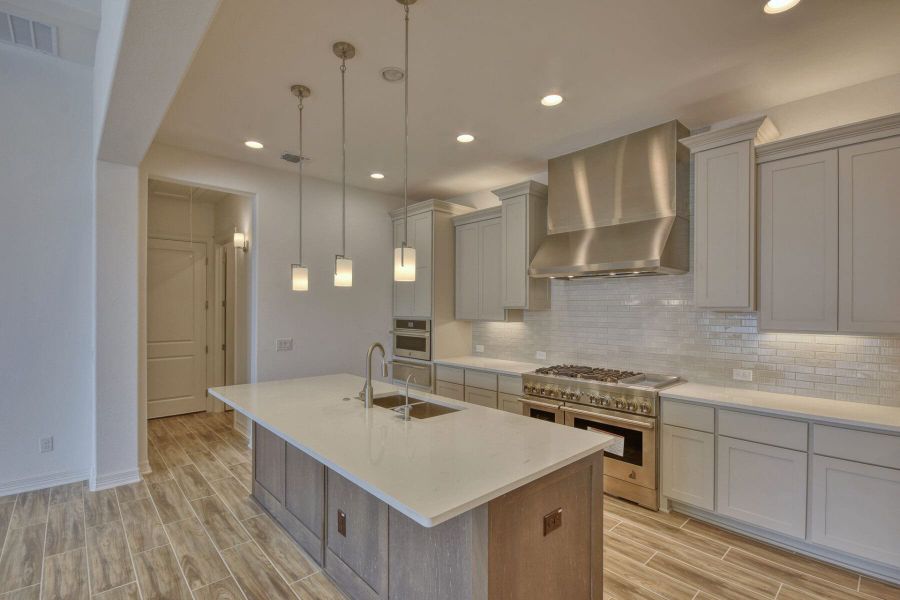Furnished interior view inside a new home in El Sonido at Campanas, San Antonio (Image 5).