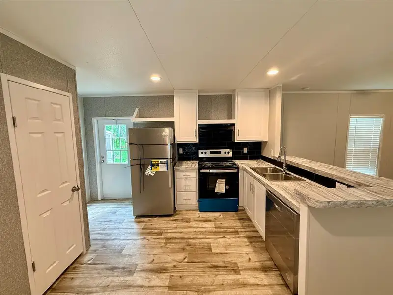 Furnished interior view inside a new home in , Wills Point (Image 3).