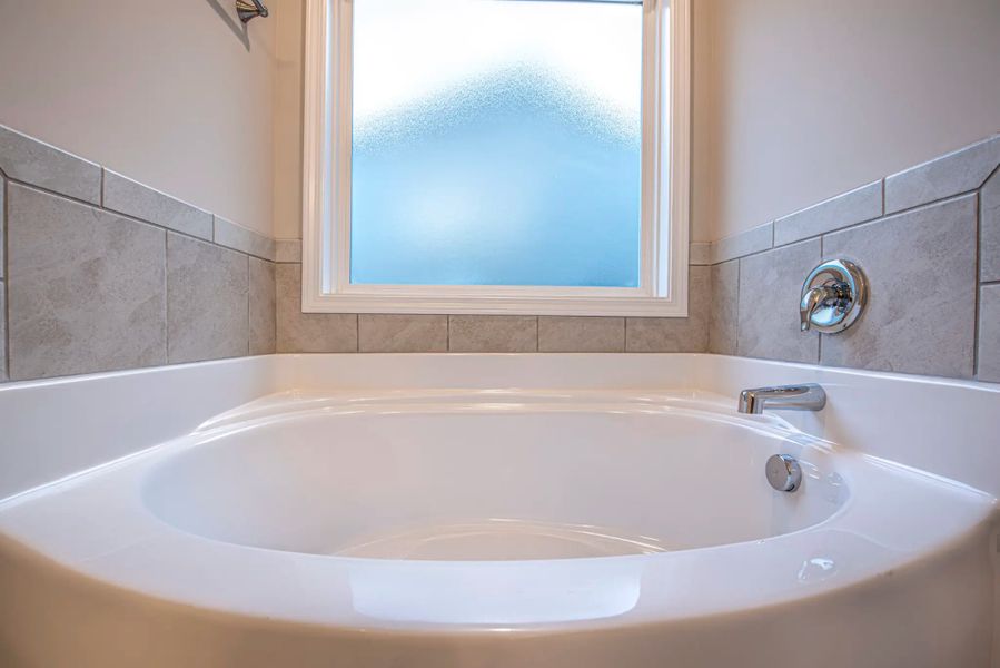 Representative furnished interior of a home built from the Bayhill A by JC Jackson Homes,LLC in Heritage Pointe, Newport (Image 9).