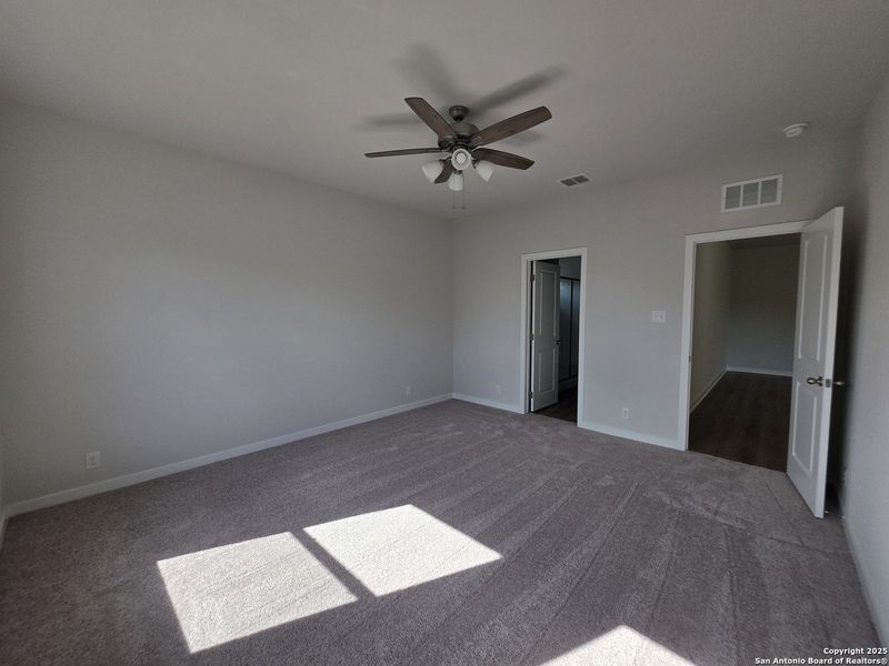 Spacious, unfurnished interior of a new home in The Summit at Saddlebrook Ranch 55's, Schertz (Image 21).