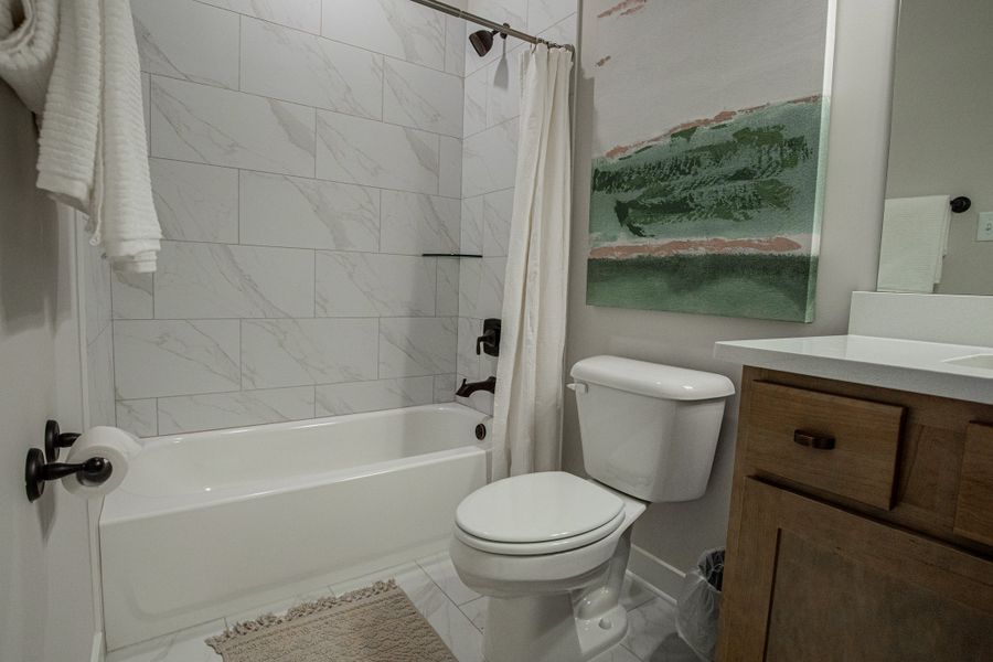 Representative furnished interior of a home built from the Willow by Grant & Co in Manor at Hall Creek, Arlington (Image 132).