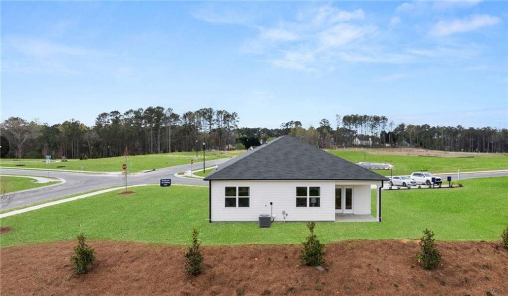 Front exterior of a new home in Twin Lakes, Hoschton, GA, highlighting curb appeal (Image 1).
