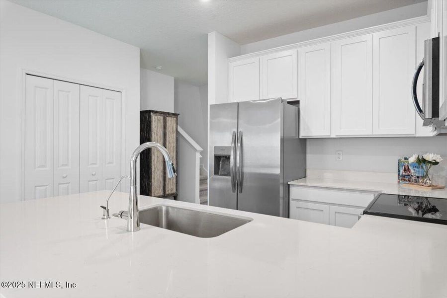 Furnished interior view inside a new home in Hardwick Farms: Hardwick Farms - Townhome Collection, Jacksonville (Image 39).