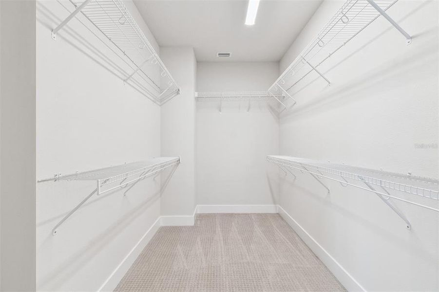 Spacious, unfurnished interior of a new home in Emerald Landing at Waterside at Lakewood Ranch – Cottage Series, Sarasota (Image 28).