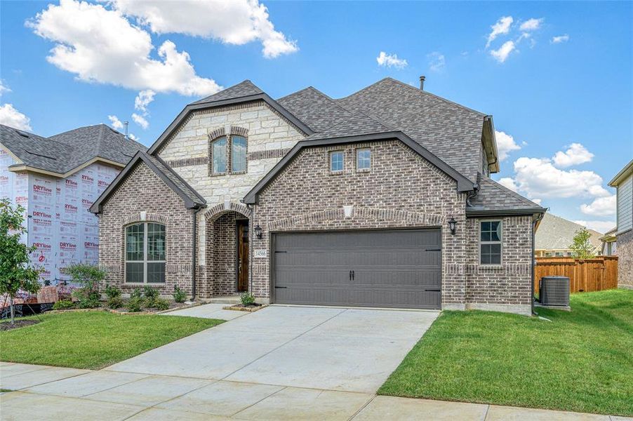 Front exterior of a new home in Creekview Meadows, Pilot Point, TX, highlighting curb appeal (Image 1).