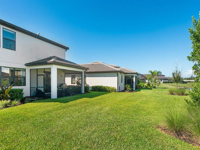 Front exterior of a new home in , Lakewood Ranch, FL, highlighting curb appeal (Image 23).