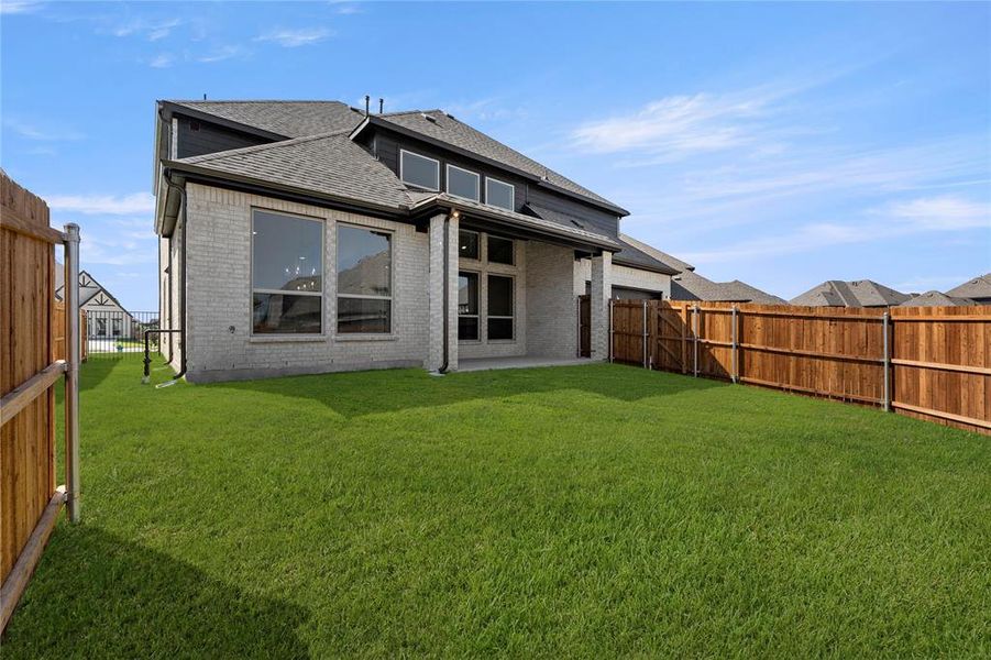 Exterior details and patio area of a home in Collinsbrook Farm, Frisco (Image 21).