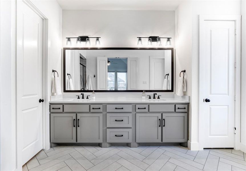 Dual sinks and gorgeous tile flooring - love the pattern!