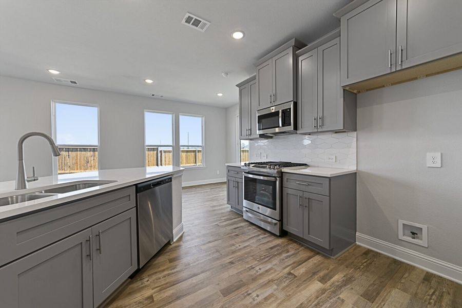 Representative furnished interior of a home built from the Symmetry D370 by Landon Homes in Lexington Frisco, Frisco (Image 7).
