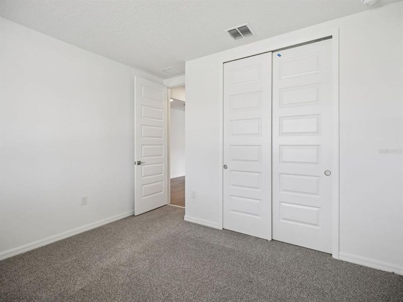 Spacious, unfurnished interior of a new home in Salt Meadows - Signature Series, Parrish (Image 25). Spacious, unfurnished interior of a new home in Salt Meadows - Signature Series, Parrish (Image 25).