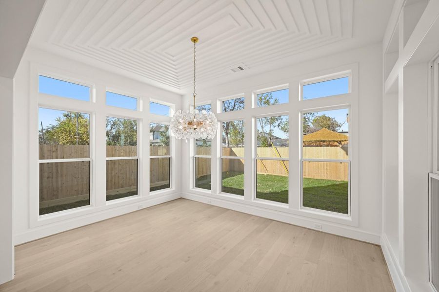 The spacious dining room is filled with natural light!