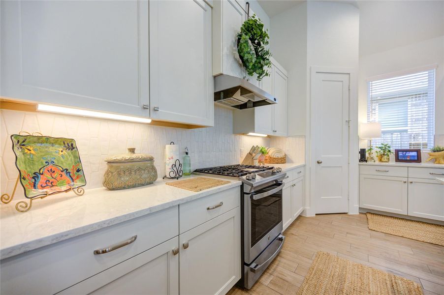 Beautiful cabinetry and thoughtful design create a welcoming space. Beautiful cabinetry and thoughtful design create a welcoming space.