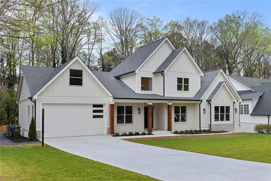 Front exterior of a new home in , Atlanta, GA, highlighting curb appeal (Image 26).