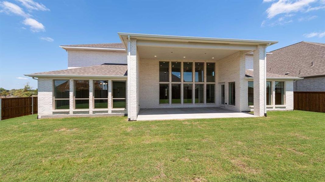 Front exterior of a new home in Terraces 82'/100', Rockwall, TX, highlighting curb appeal (Image 1).