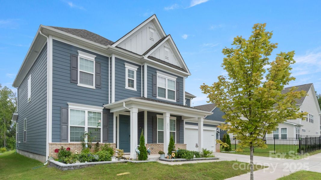 Front exterior of a new home in , Fort Mill, SC, highlighting curb appeal (Image 19).