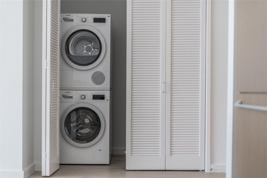 A dedicated laundry closet offers a convenient, space-saving solution for daily chores. A dedicated laundry closet offers a convenient, space-saving solution for daily chores.