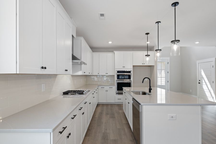 Representative furnished interior of a home built from the Bowman by Hunter Quinn Homes in Landing at Clemson Marina, Seneca (Image 5).