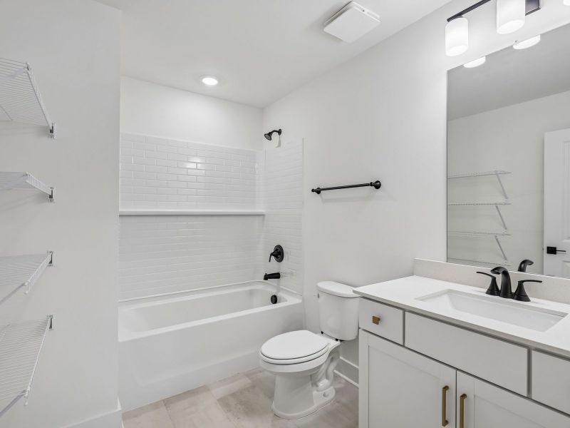 Furnished interior view inside a new home in Station Hill - Estate Series, Franklin (Image 6).