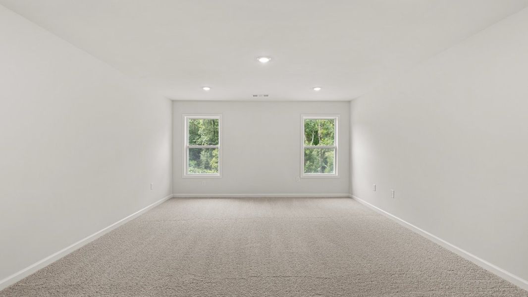 Representative unfurnished interior of a home built from the Lynnbrook by D.R. Horton in Haven Abbey, Cumming (Image 23).