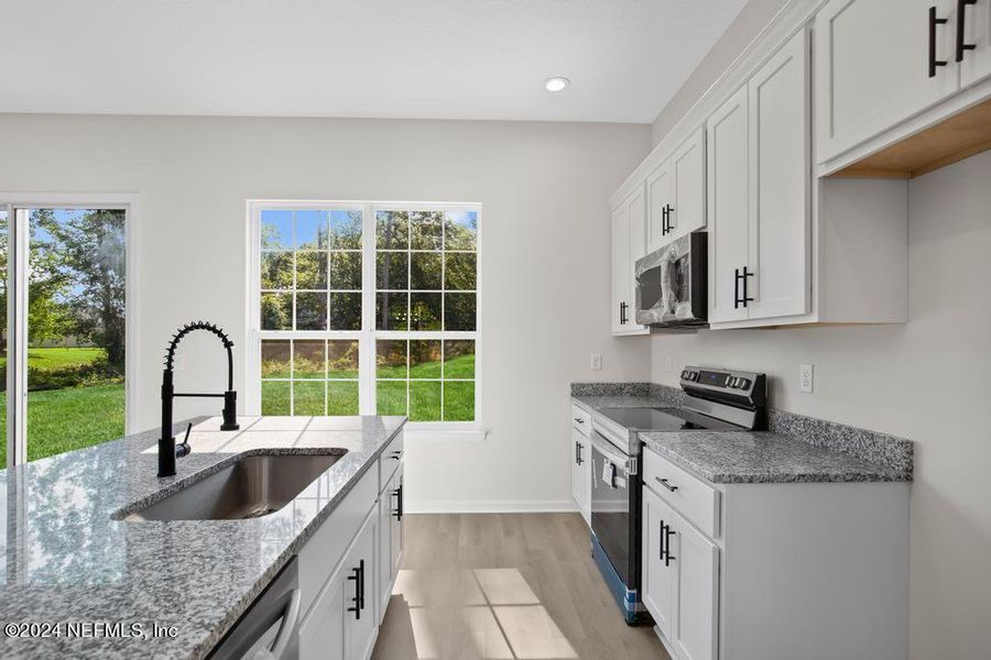 Furnished interior view inside a new home in , Jacksonville (Image 10).
