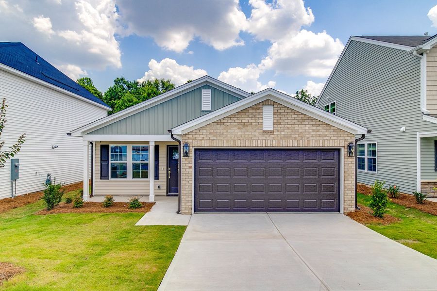 Front exterior of a new home in Bluefield, Lexington, SC, highlighting curb appeal (Image 1). Front exterior of a new home in Bluefield, Lexington, SC, highlighting curb appeal (Image 1).