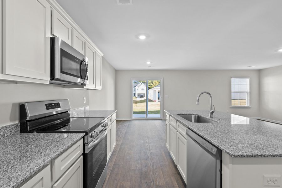 Representative furnished interior of a home built from the Larch Single-Family B by McGuinn Homes in Willow Lake, Blythewood (Image 5).