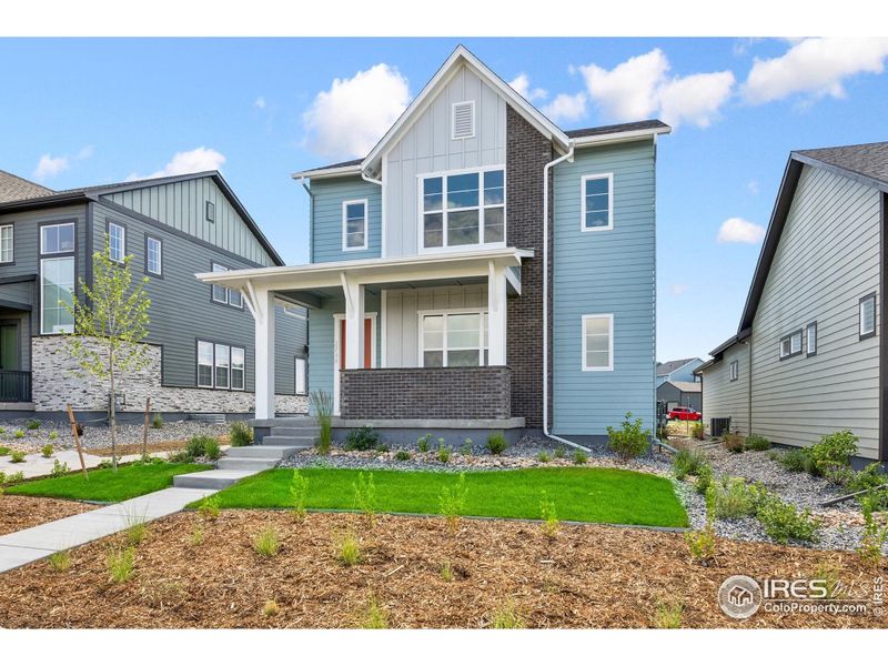 Exterior details and patio area of a home in Kinston Cottage, Loveland (Image 3).