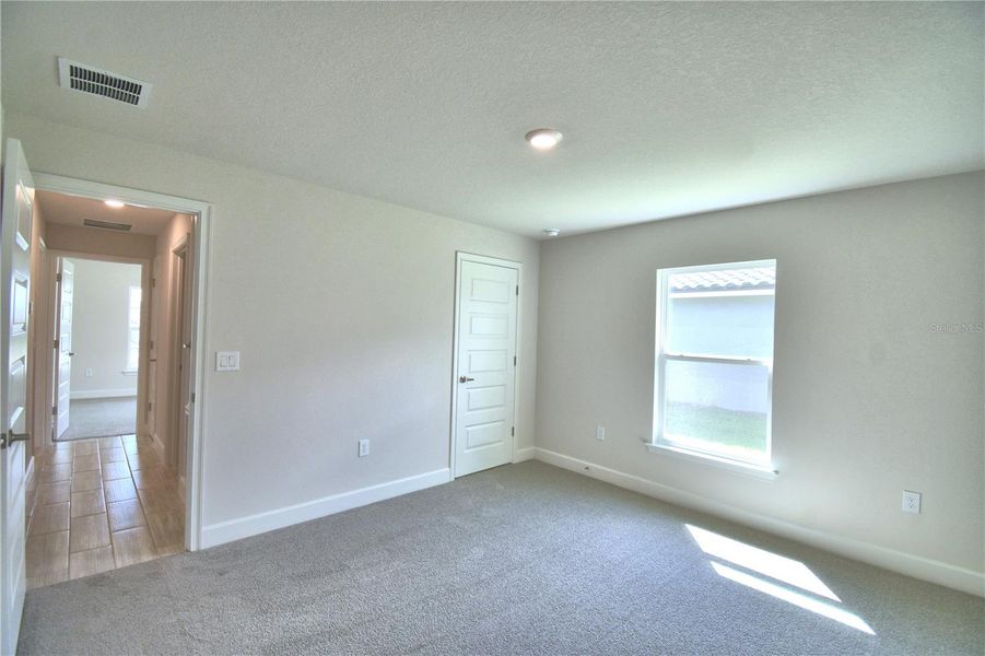 Spacious, unfurnished interior of a new home in Lake Juliana Estates, Auburndale (Image 26).