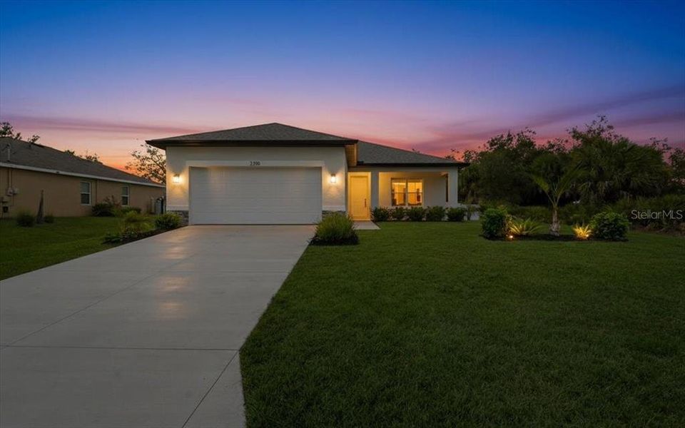 Front exterior of a new home in , North Port, FL, highlighting curb appeal (Image 29).